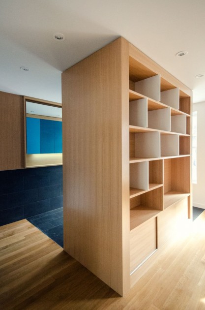 Brilliant Divider With Blue Storage Cabinet On One Side And The Blonde Wooden Book Case On Another Architecture