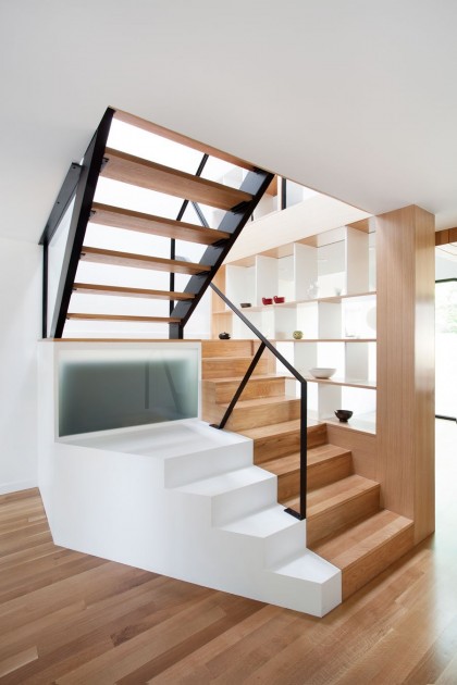 Chic Multi Function Wooden Staircase With Additional Storage Room And Attached Shelves 420x630 Architecture