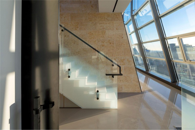 Cool Blurred Frosted Glass Used For Railing Staircase Among The Yellow Rustic Tiles Walling Resort & Villa