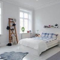 Bedroom Cozy Scandinavian Bedroom Has White Wall Painting Stunning-Bedroom-with-Black-Divan-and-White-Bed-Mattress-425x630