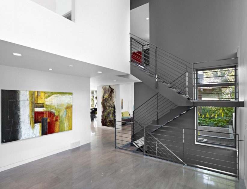Dazzling Artistic Hallway With Transparent Chrome Railing Staircase 822x630 Architecture