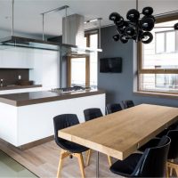 Resort & Villa Elegant Contemporary Dining Room With Blonde Wooden And Black Built Up Furniture Integrated With Brown Backsplashed Modern Kitchen Cool-blurred-frosted-glass-used-for-railing-staircase-among-the-yellow-rustic-tiles-walling