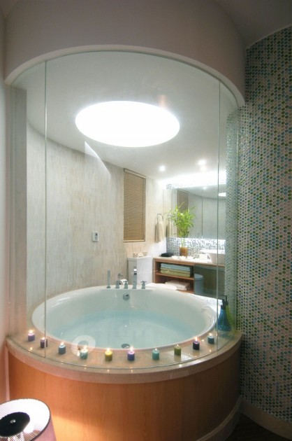 Extra Luxury Bathroom With Circle Bathtub And Perfect Lighting 418x630 Interior Design