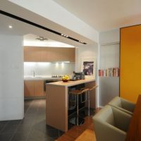 Interior Design Lovely Kitchen With Small Kitchen Island With Some Wooden Bar Stools 418x630 The-Media-Room-near-the-Living-Room-with-Sparkling-Lighting-on-Desk-of-Large-Screen