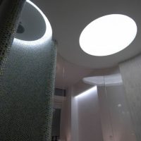 Interior Design Perfect Lighting Shown By Circle Lamp Above It 418x630 Big-Circle-Column-with-White-and-Green-Mozaic-Tile-of-it-750x630