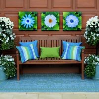 Garden Stunning Patio With Wooden Bench With Cushions And Flowers Semi-Open-Patio-with-Grey-Bench-added-by-Some-Striped-Cushions-464x630