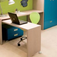 Kids Room Movable Study Desk With Natural Wood Material And Macbook 560x656 Stunning-Green-Yellow-Kids-Bedroom-Furniture-With-Share-Study-Desk-And-Floor-Red-Beds-560x334