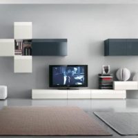 Ideas Shining White Living Room With Modern Wall TV Setups 560x325 Outstanding-TV-Wall-Mount-With-Grey-Furniture-560x325