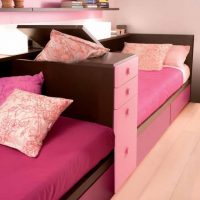 Kids Room Twin Pink Sofa Bed With Functional Divider Storage 560x663 Bright-Twin-Girls-Bedroom-Design-Movable-Beds-560x270