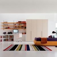 Architecture Very Colorful Teen Bedroom With Striped Rugs 560x335 Kids-Room-Striped-Wall-Decor-With-Orange-And-White-Furniture-Combinations-560x432