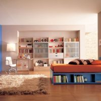 Architecture Warm Kids Bedroom With Unique Rugs And Blue Orange Furniture 560x420 Very-Bright-And-Cool-Beddroom-With-Blue-Theme-For-Teen-560x336