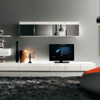 Ideas Warm Living Room Design With Catchy Orange Sofas 560x325 White-Brown-Modern-Wall-TV-Mount-For-Living-Room-560x325