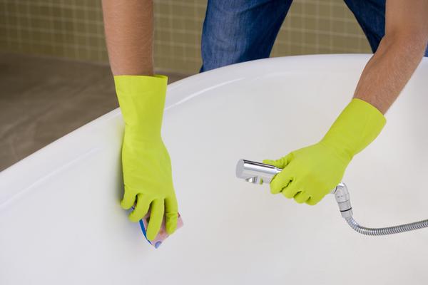 Clean A Bathtub Discoloration With Brush Bathroom