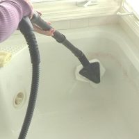 Bathroom Clean A Bathtub With Triangle Brush Clean-a-Bathtub-Discoloration-With-Brush